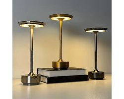 Oplaadbare Goudkleurige Metalen Tafel Lamp**Breng een vleugje luxe in je interieur met onze prachtige goudkleurige metalen tafellamp. Deze elegante lamp is een eye-catcher.